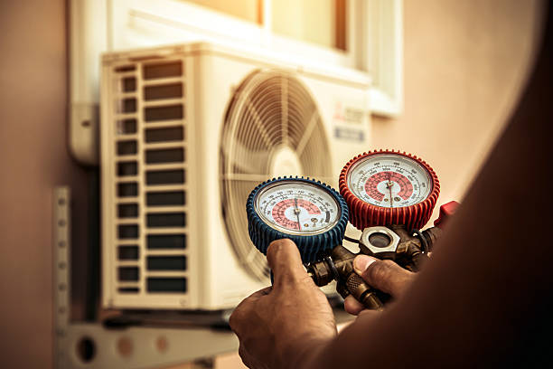 Professional Air Conditioning Service technician working in Southside, TN